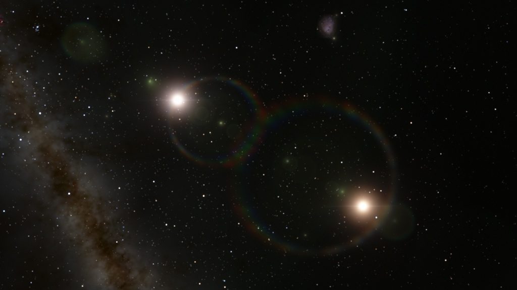 A pair of stars, each with their own lens flare